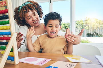 Image showing Learning, happy and education with mother with son study for home schooling, kindergarten and tutor. Teaching, child development and lesson with black woman and child for language, math and creative