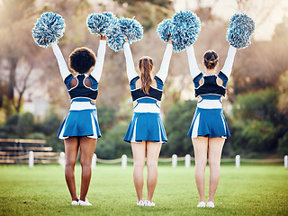 Image showing Cheerleader, teen girl team and cheers outdoor, athlete group and fitness, uniform and diversity with back. Exercise, competition and arms raised, collaboration and pom pom, female and sports event