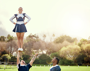 Image showing Cheerleader, people on team outdoor and athlete group with fitness, uniform and cheerleading routine with balance. Exercise, competition and cheers, collaboration and happy with sport event on campus