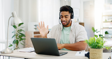 Image showing Headphones, man and laptop for webinar, greeting and conversation in living room. Male, guy and person with device, headset and online conference for training, virtual chat and wave to start meeting