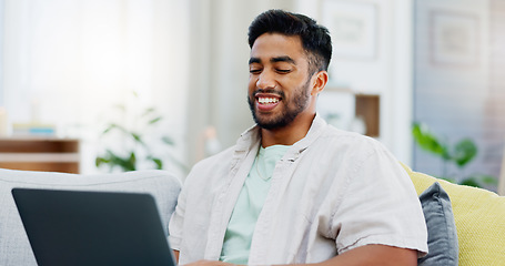 Image showing Laptop, laughing and man on couch watching funny video, live streaming or reading post on social media. Happy person relaxing on sofa with computer, internet and wifi in his apartment or living room