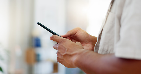 Image showing Closeup, man and hands with smartphone, typing and connection for social media, texting and email. Zoom, hand and cellphone for texting, signal and online reading for information and communication