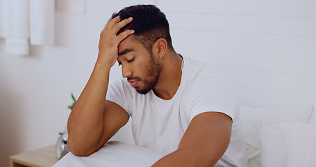 Image showing Stress, morning and man in bed with depression problem, insomnia and anxiety alone at home. Mental health, sadness and unhappy male in bedroom depressed, worried and frustrated from sleeping issue