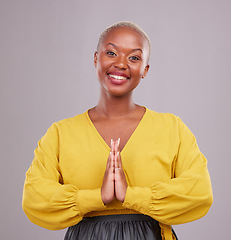Image showing Woman, praying and hands together in religion, faith and hope or thank you of career opportunity on studio background. Christian or African person in gratitude portrait, peace emoji and ngo business