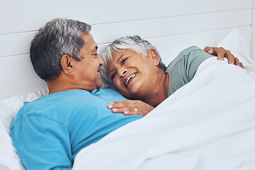 Image showing Bed, smile and senior couple with love, relax and marriage with retirement, relationship and conversation. Morning, elderly man and old woman with romance, bedroom and trust with peace, home and care