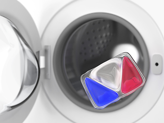 Image showing Laundry detergent pod and washing machine