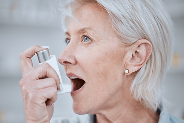 Image showing Senior woman, asthma inhaler and breathe with pharmaceutical product, medical or healthcare. Elderly woman, pump and spray for oxygen, wellness or emergency for lungs, mouth or thinking with medicine