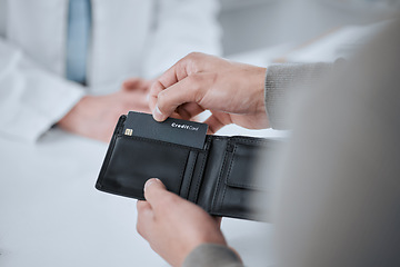 Image showing Person, hands and credit card at pharmacy in payment for medication, drugs or pharmaceuticals at checkout. Closeup of customer with debit at drugstore for banking, purchase or buying medical product