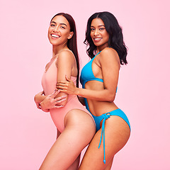 Image showing Portrait, smile and women with body positivity, swimwear and luxury on a pink studio background. Support, models and girls with wellness, bikini and friends with health, natural beauty and fitness