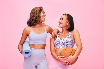 Image showing Sports, fitness and women on pink background for yoga, training and exercise with ball and yogi mat. Friends, happy and people in studio with gym equipment for wellness, workout and healthy body