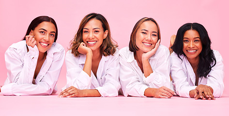 Image showing Portrait, smile and lingerie with woman friends on a pink background in studio for natural skincare. Diversity, beauty and wellness with a female model group posing for health, inclusion or cosmetics