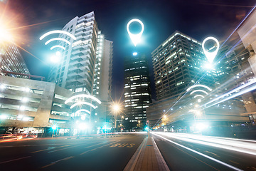 Image showing City street, internet and night, wireless connectivity with building, technology abstract and communication. Pin location, connection and urban landscape, light with cyber and digital transformation