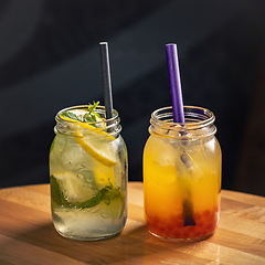 Image showing Two different summer iced lemonade