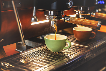 Image showing Espresso pouring from coffee machine