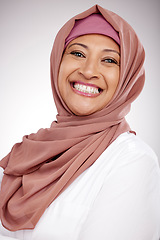 Image showing Woman, muslim and face or happy portrait in hijab for fashion, culture and religion on a white background. Islamic or arabic person from Saudi Arabia and clothes, style or smile with faith in studio