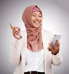 Image showing Phone, social media and a senior muslim woman in studio on a gray background for communication as an app user. Mobile, finger print or biometrics with a happy islamic person browsing the internet