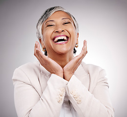 Image showing Funny, portrait and beauty of mature woman in suit in studio isolated on a white background. Face hands, makeup cosmetics and excited model with laugh in spa facial treatment for skincare antiaging