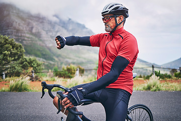 Image showing Smart watch, sports man and bicycle outdoor to check pulse, fitness time or cardio progress. Exercise, wristwatch app and cycling gear of mountain bike athlete training for race, triathlon or journey