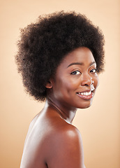 Image showing Black woman, face and beauty portrait in studio for skin care, dermatology and natural glow. Smile of a happy African model person with afro hair, cosmetics and self love on a beige background