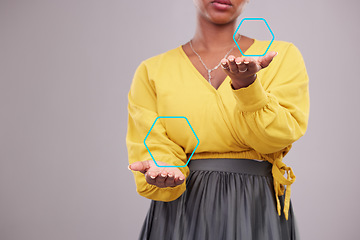 Image showing Hexagon graphic, technology and hands on a studio background for digital connection. Pattern, closeup and a person with a hexagon in palm for networking, business or futuristic isolated on a backdrop