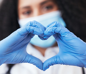 Image showing Healthcare, hands and doctor with emoji heart at a hospital for support, hope or thank you for organ or blood donation. Zoom, love and female nurse with finger frame for gratitude in medical research