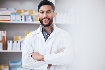 Image showing Pharmacy, crossed arms and portrait of man for medical service, medicine and wellness. Healthcare, pharmaceutical and happy pharmacist in drug store for medication, consulting and clinic career