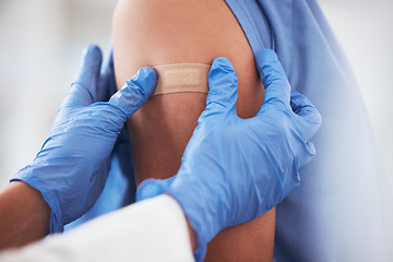 Image showing Healthcare, vaccine and plaster on arm of person in hospital for covid, flu or immunization closeup, Doctor, hands and zoom on patient at a clinic for medical, consultation and disease vaccination