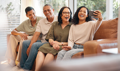 Image showing Happy family, sofa and selfie laughing in photography, memory or holiday weekend and bonding together at home. Couple and parents smile for photograph, picture or social media on living room couch