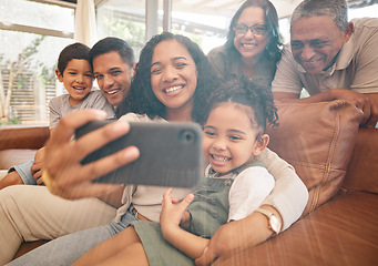 Image showing Family selfie, happy grandparents and children on sofa with hug, love and relax together at home for social media. Interracial people, mom and dad with kids on couch for profile picture photography