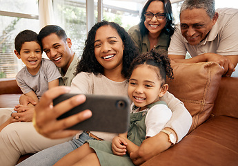 Image showing Big family, selfie and grandparents with children on sofa for holiday, love and relax together at home. Interracial people, mother and father with kids smile on couch for profile picture photography