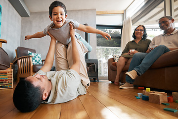 Image showing Airplane, portrait and boy child with father on a floor for playing, games and bond at home with grandparents. Flying, fantasy and excited kid with parent in living room for fun family time in house