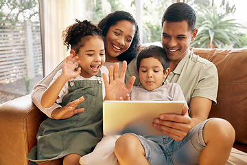 Image showing Tablet, video call and family with wave, greeting and smile on a living room sofa at home. Mother, dad and children together with online communication of parents and kids with discussion on web app