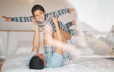 Image showing Kid, father and smile on bed for airplane games, support and relax at home for crazy fun. Portrait, dad and boy child excited to fly in bedroom for freedom, fantasy or balance of play, care or energy