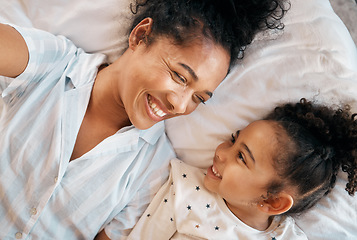 Image showing Selfie, top view and mother with girl child on a bed happy, bond and relax at home. Love, profile picture and kid with mom influencer smile for social media, blog or podcast post or bedroom memory