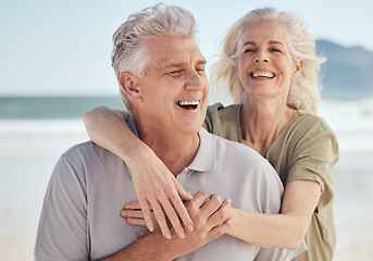 Image showing Senior, happy couple and hug on beach in support, love or care for bonding, weekend or break together. Elderly man and woman smile in happiness for holiday, vacation or outdoor getaway on ocean coast