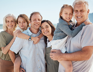 Image showing Portrait, generations and big family on beach together, smile and summer vacation travel to tropical island. Men, women and children on happy ocean holiday with grandparents, parents and kids in Bali