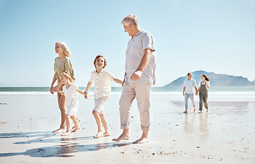 Image showing Grandparents, kids and holding hands on beach, family and parents with trust and support, tropical holiday and travel. Happiness, nature and sea with love and care, generations and people on vacation