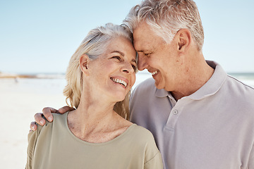 Image showing Senior couple, love and outdoor at the beach with happiness, freedom and care on vacation. Face of a man and woman on retirement holiday, adventure and romantic trip in nature to relax and travel