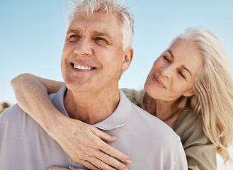 Image showing Senior, happy couple and hug on beach in care, love or support for bonding, weekend or break together. Elderly man and woman smile in happiness for holiday, vacation or outdoor getaway on ocean coast