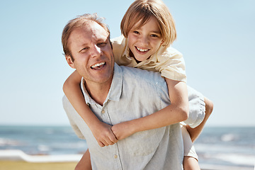 Image showing Happy father, child and piggyback on beach in family bonding, outdoor weekend or holiday on summer break. Portrait of dad and son in hug, love or care for childhood or enjoying day together at ocean