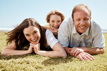 Image showing Portrait, family and smile on vacation at beach, bonding and funny laugh together. Parents, children and mother with father at ocean, happy and having fun to travel on summer holiday outdoor at sea