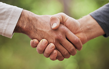 Image showing Support, thank you and handshake with people in nature for motivation, welcome and meeting. Teamwork, trust and collaboration with closeup of friends shaking hands in park for partnership and hello