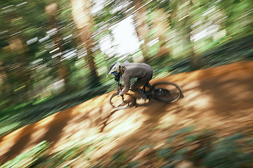 Image showing Bicycle, man and forest speed blur for workout outdoor in woods for healthy body. Mountain bike, nature and athlete training, cycling fast or off road adventure on journey, exercise or sport travel