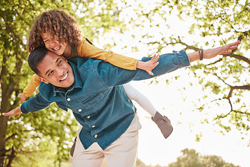 Image showing Nature, fly and happy child, father and piggyback ride for fun outdoor games, Fathers Day bonding and quality time together. Woods, park and family dad, kid and playing with love, support and care