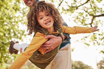 Image showing Dad, child and plan game in park, outdoor and nature on holiday, freedom or care with bonding. Excited young kid, father and swing for airplane, fast and free with play on vacation in summer sunshine