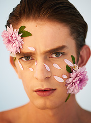 Image showing Beauty, aesthetic and flowers with portrait of man in studio for petals, natural and creative. Glow, cosmetics and spring with face of model on white background for makeup, spa and floral wellness