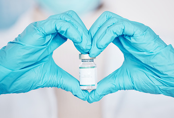 Image showing Vaccine, medical person and heart hands of doctor with medicine bottle for virus protection, safety or health security. Hospital policy, lab and closeup pharmacist, nurse and scientist with love sign