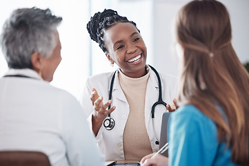 Image showing Teamwork, doctors or happy woman in meeting or discussion for hospital planning or collaboration. Leadership, smile or nurses talking or speaking of medical healthcare research, report or news update