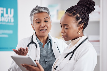 Image showing Doctors, mentor and student with tablet and healthcare, women medical professional team and hospital dispensary. Pharmacy, health and digital schedule, collaboration and tech with drugs and medicine