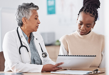 Image showing Documents, meeting or doctor consulting a patient in hospital for healthcare history or record. People, medical or nurse with black woman talking or speaking of test results, insurance or advice